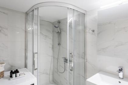 Absolute 2BR Apartment near EMST Museum by UPSTREET - image 21