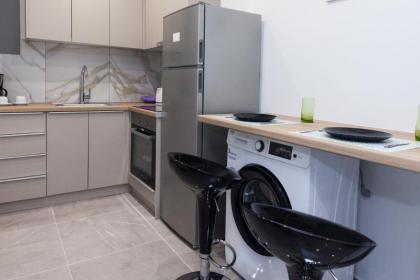 Stylish Brand New Apt near Megaro Mousikis - image 21